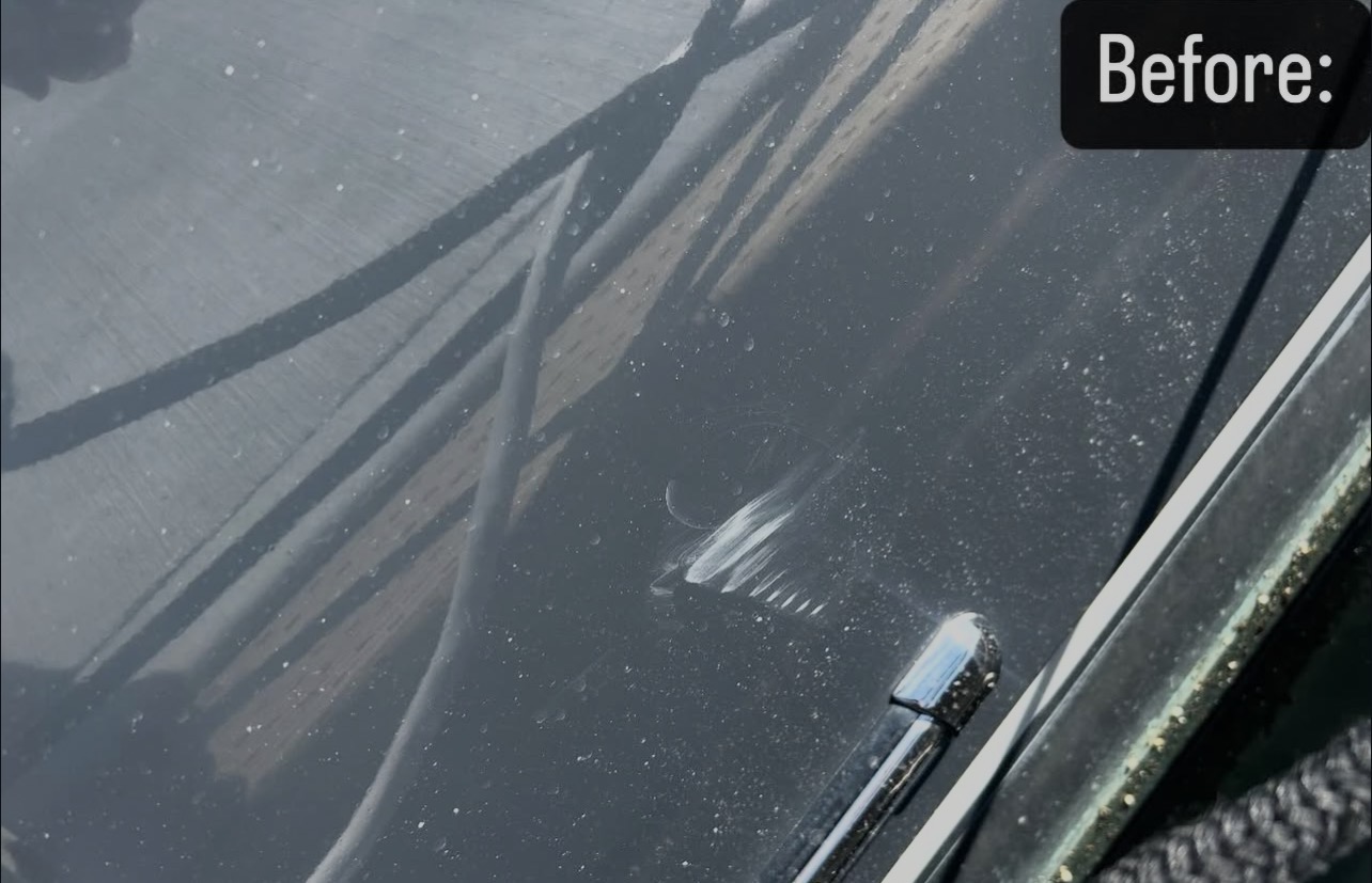 Before — heavy gelcoat oxidation on hull